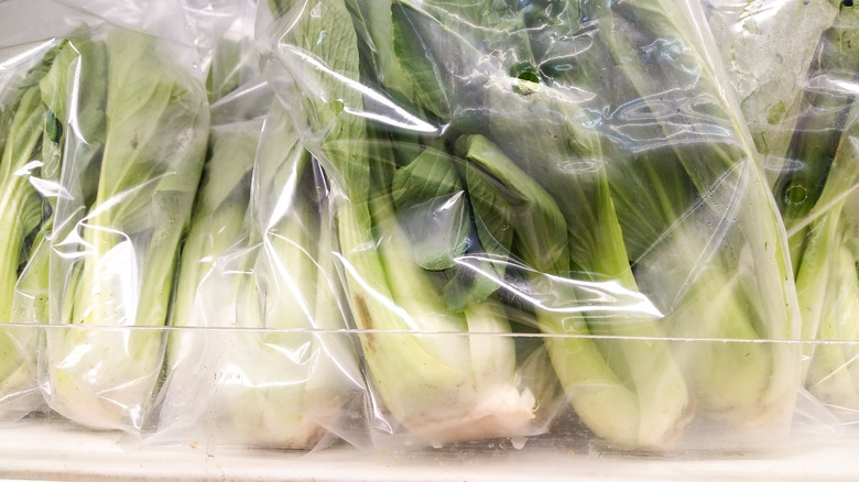 Bok choy in plastic bags