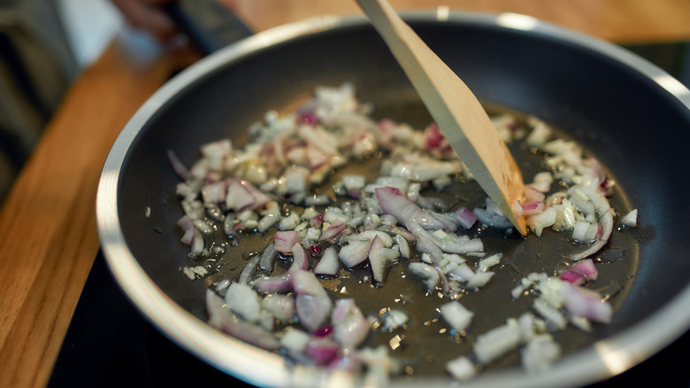 garlic and onion sauteed in pan