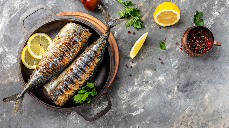 Fish on a plate with slices of lemon