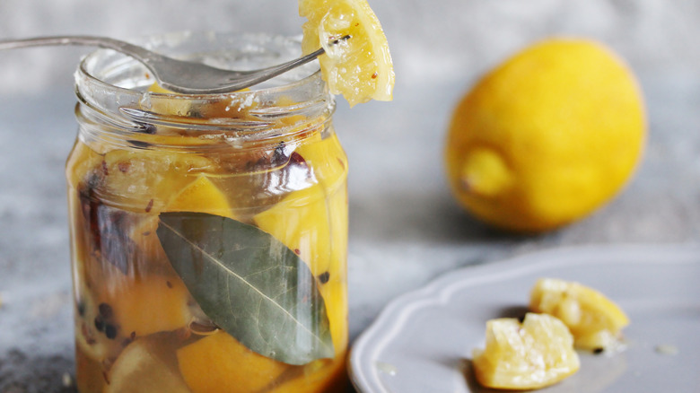 A jar full of preserved lemons