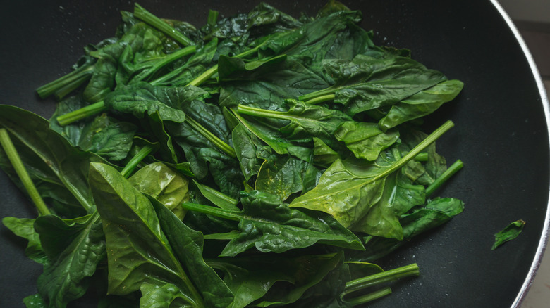 Overcooked spinach in pan