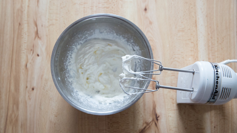whipped cream in mixing bowl