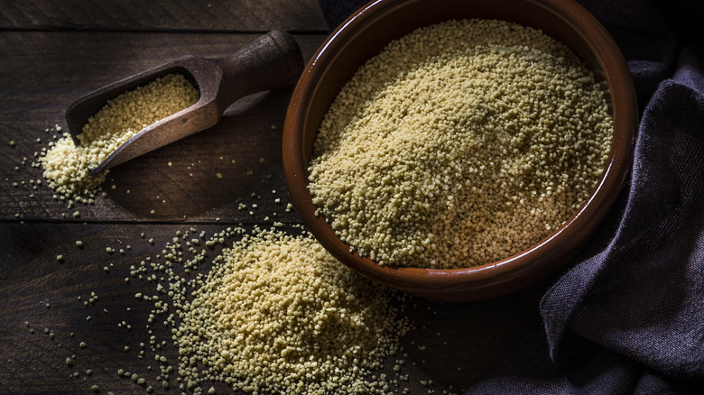 Couscous in large wooden bowl