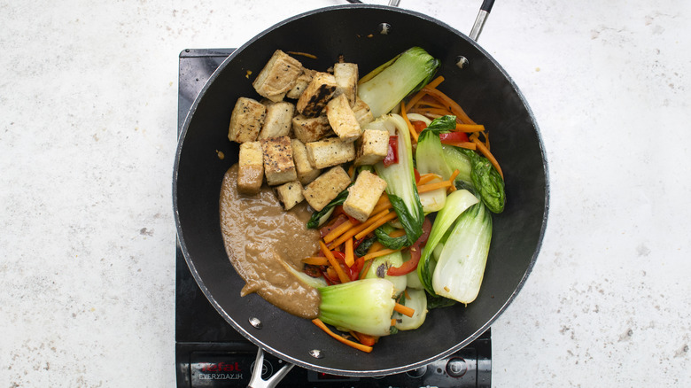 vegetables and tofu in pan