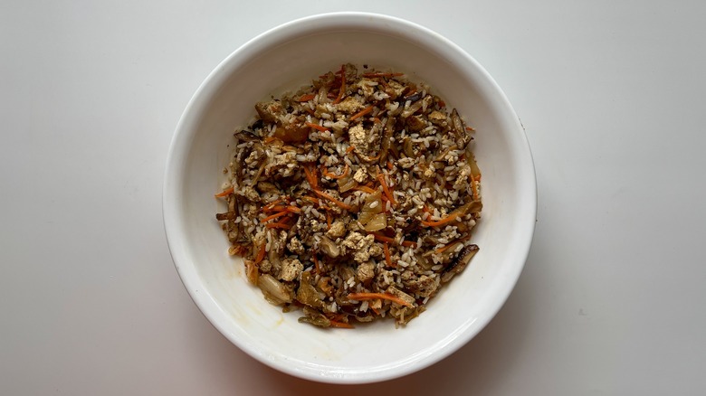 tofu rice and vegetables in mixing bowl