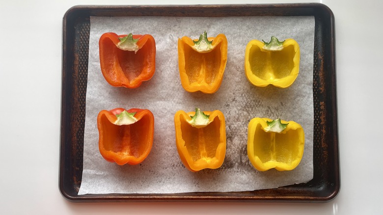 bell pepper halves on sheet pan