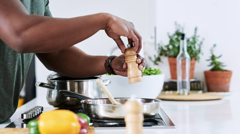 Man cooking with spices