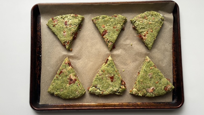 triangular green scones in pan