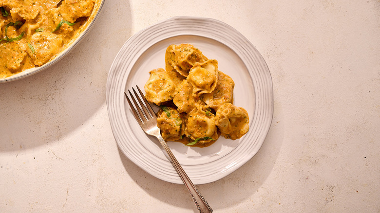 tomato pesto tortellini on plate