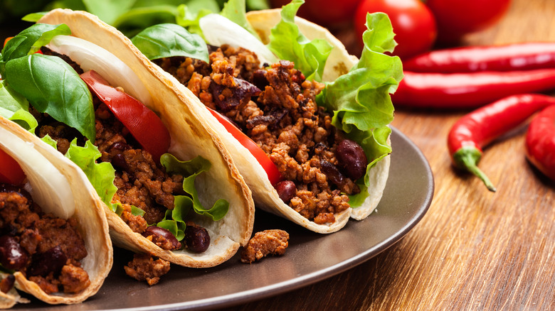 A close-up of ground beef tacos