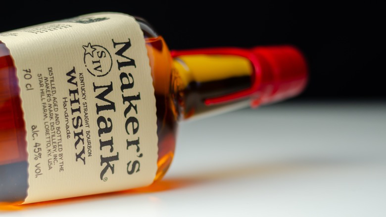 Maker's Mark Bourbon whisky bottle on side