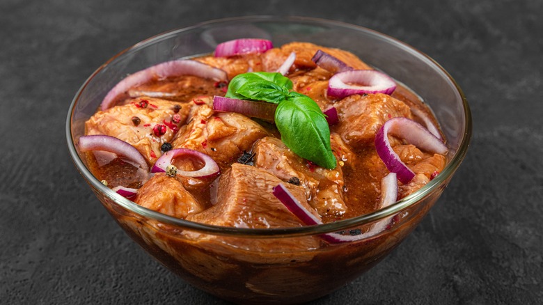 Meat in bowl with vegetables