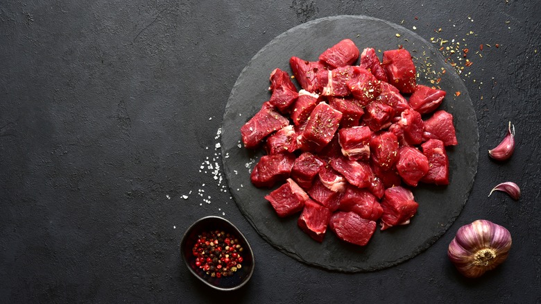 Raw kebab meat on plate