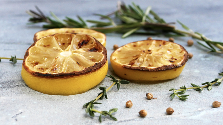 Charred lemons and herbs