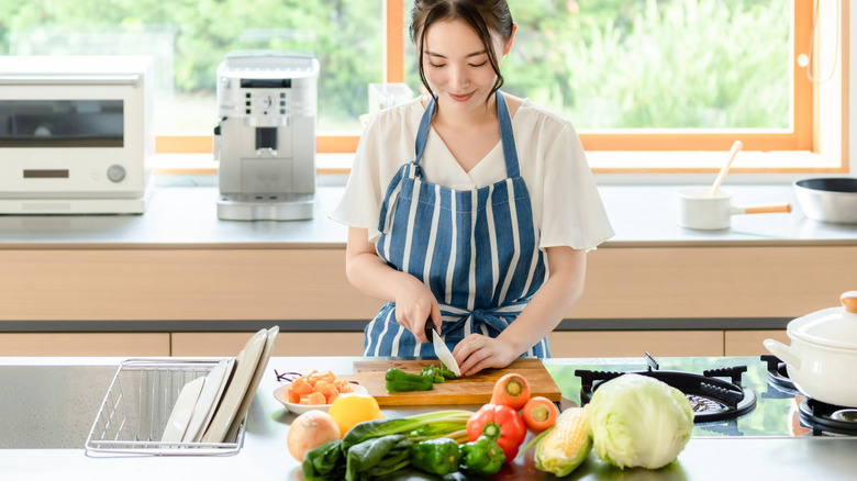 Person chopping vegetables