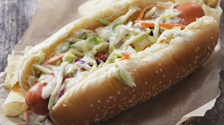 Close up of coleslaw on hot dog