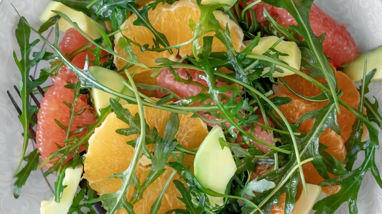 salad topped with grapefruit