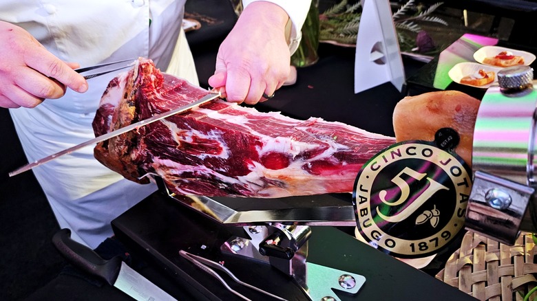 Ibérico ham being sliced