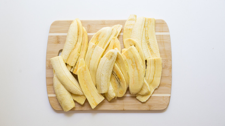 sliced plantains on cutting board