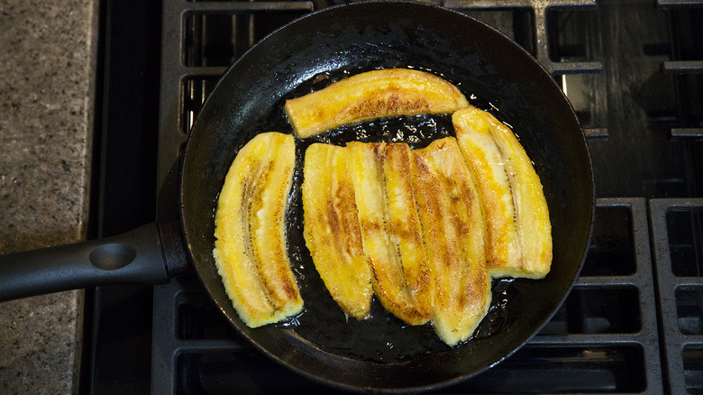 fried plantain slices in pan