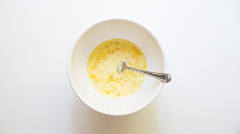 whisked egg mixture in bowl