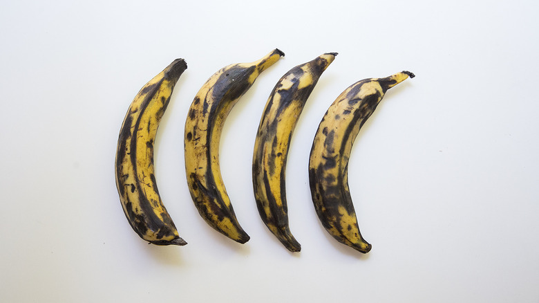 ripe plantains on white background