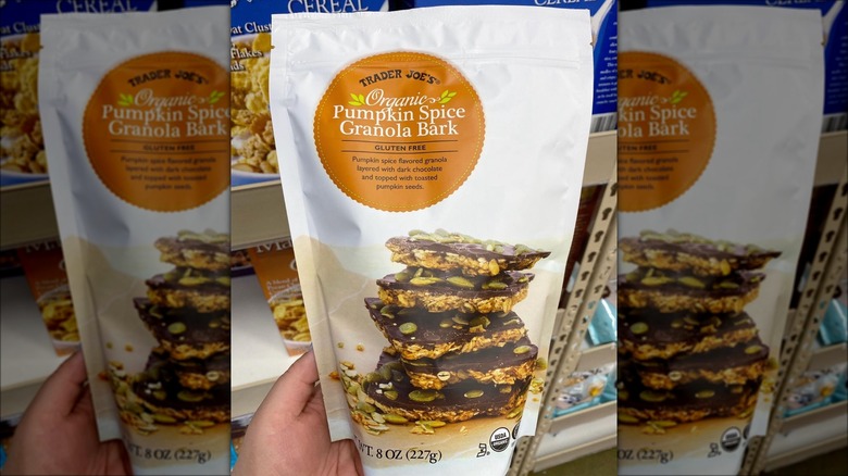 Hand holding Trader Joe's Pumpkin Spice Granola Bark