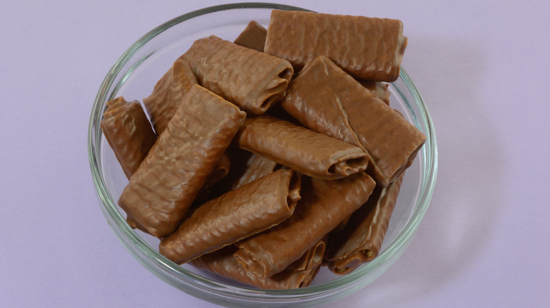 Bowl of chocolate covered crepe cookies