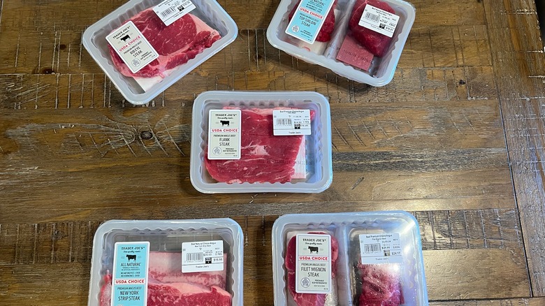 Trader Joe's steaks in containers on table