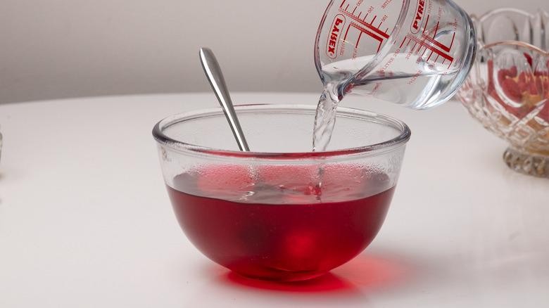 pouring cold water into jelly