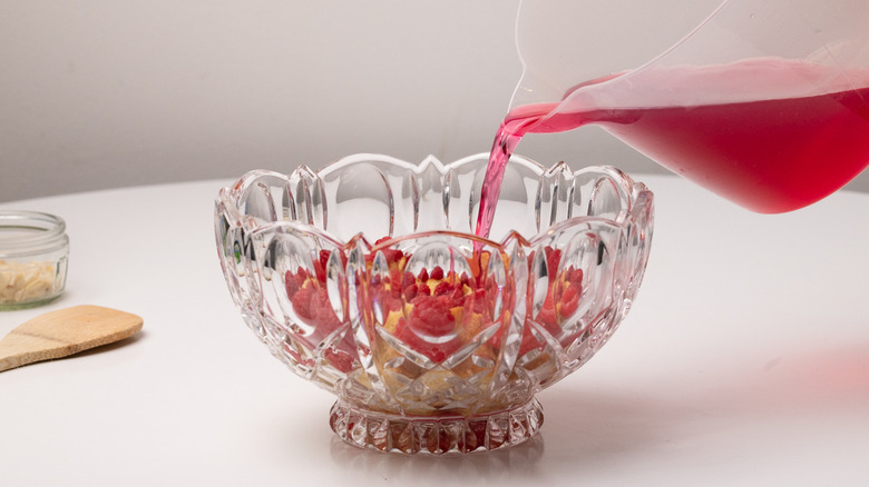 pouring jelly into trifle dish