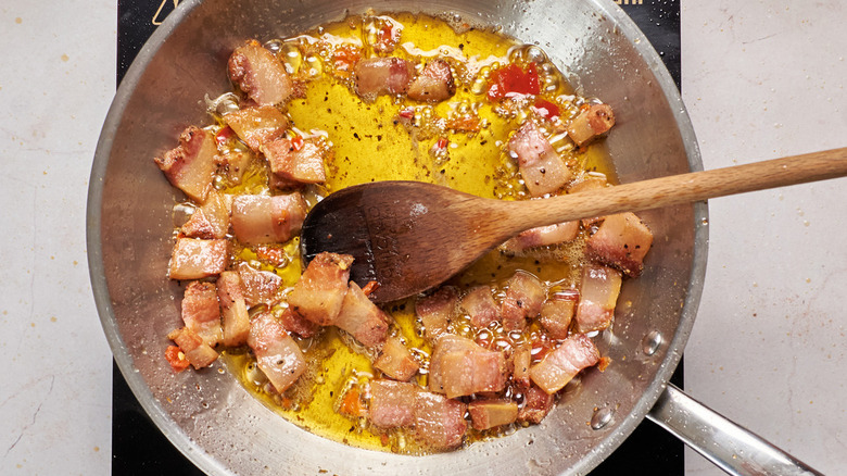 simmering guanciale in wine