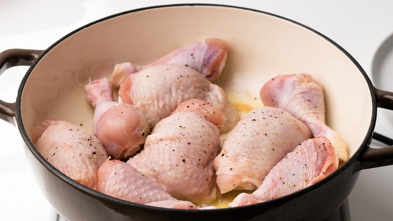 chicken pieces in a pan