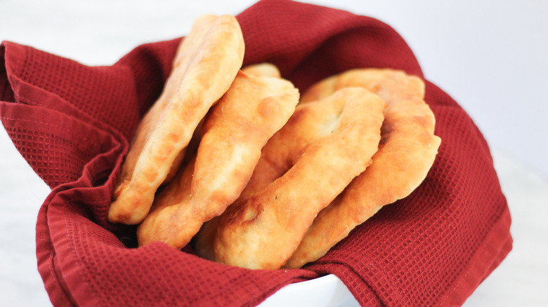 fry bread in napkin-lined basket