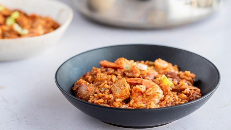 finished jambalaya in a black low bowl 