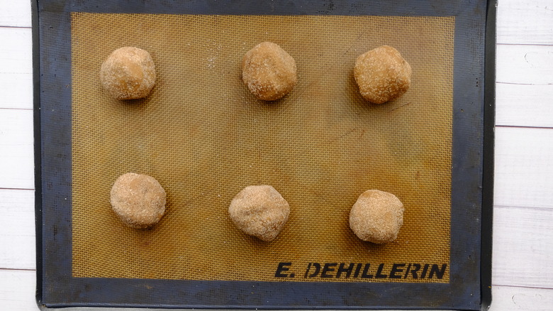 dough balls on a baking sheet