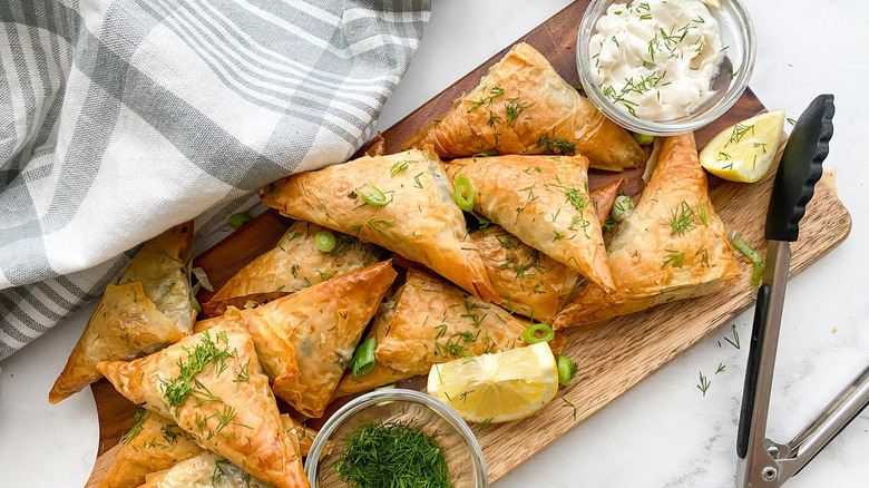 spanakopita on wooden board