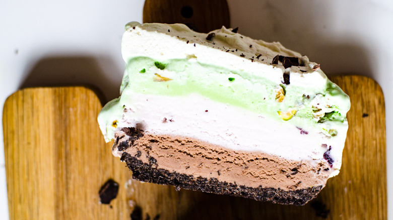 slice of spumoni ice cream cake on cutting board