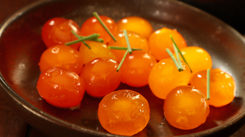 cured egg yolks garnished with herbs