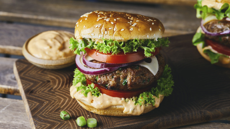 burger on wood board