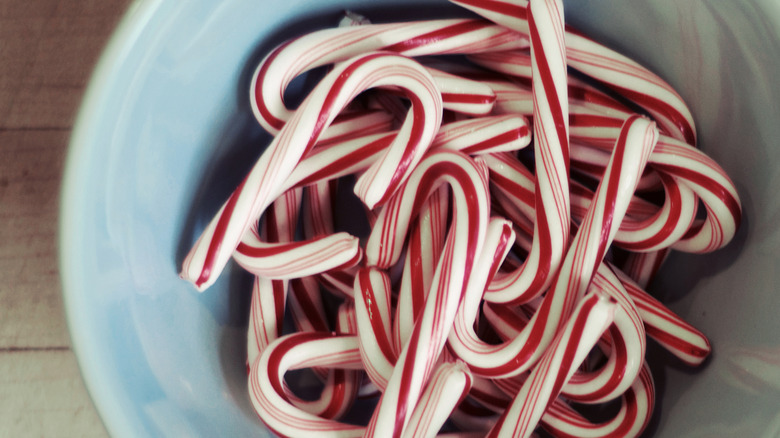 candy canes in a bowl