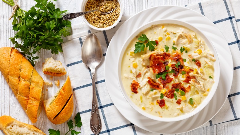 A creamy soup with bread and coriander