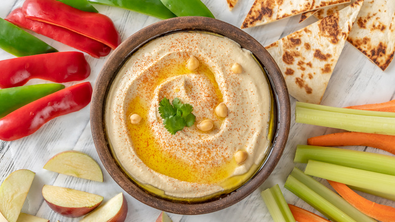 bowl of hummus with dipping options