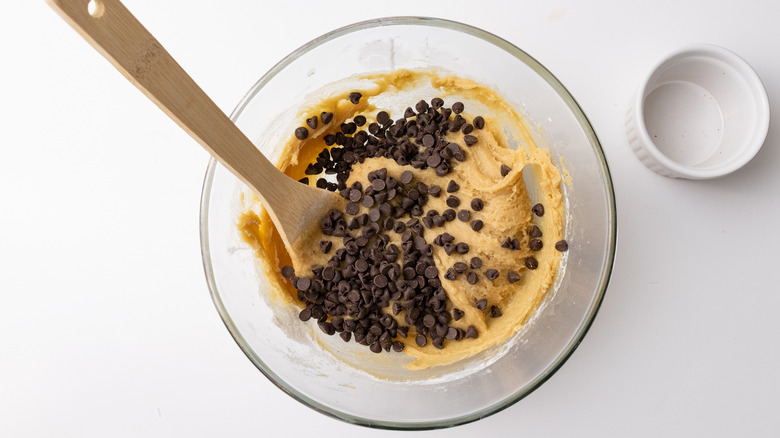 mixing cookie dough in bowl