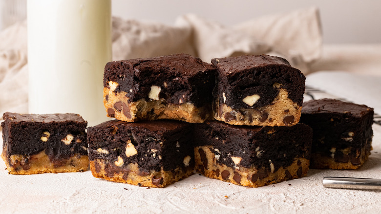 stacked brownie cookies on table 