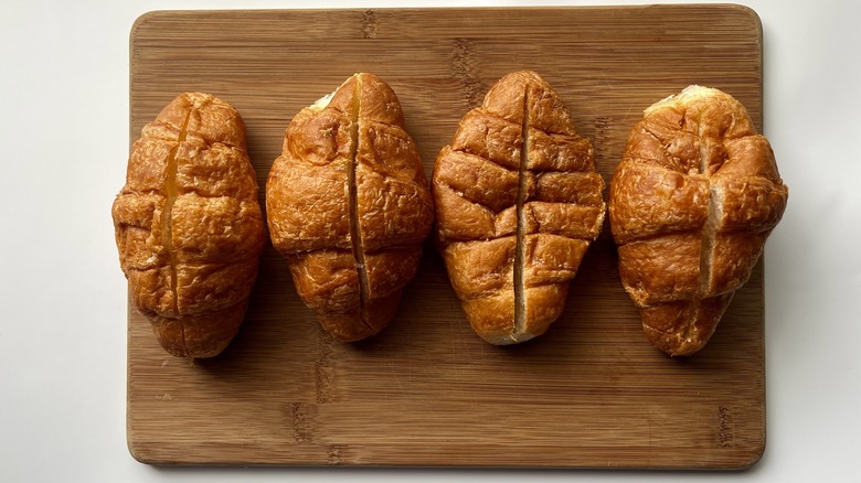 sliced croissants on cutting board