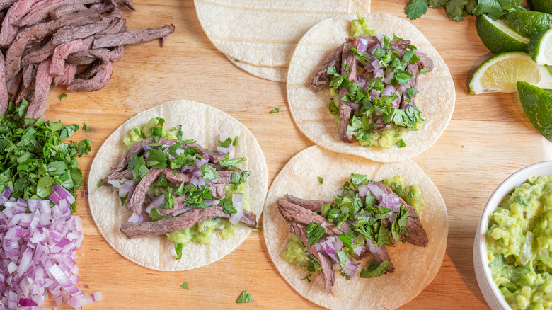 assembling tri-tip tacos