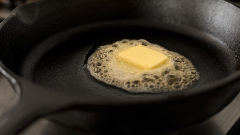 butter melting in cast iron skillet