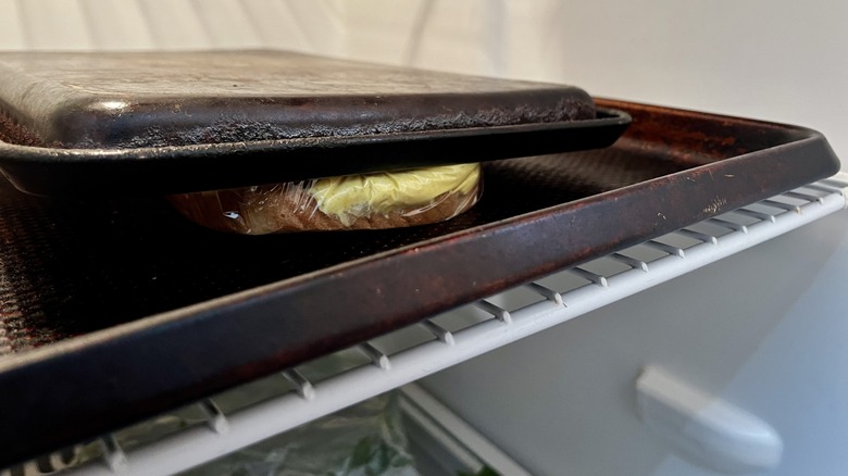 baking sheets on refrigerator shelf