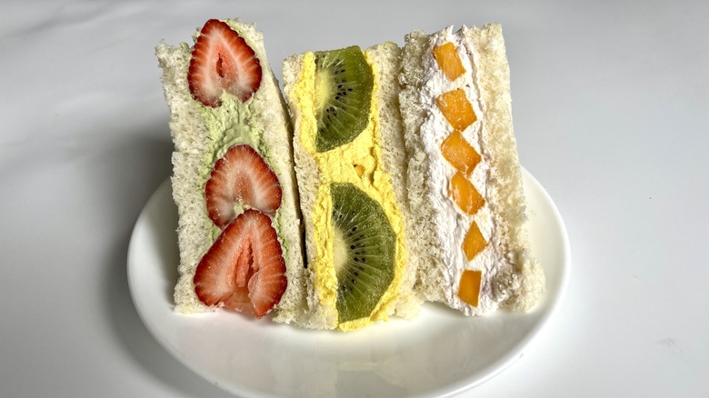 three sandwiches with fruit filings